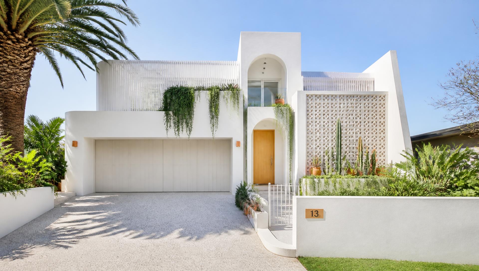 Bright modern Melbourne home with a premium exposed pebble driveway
